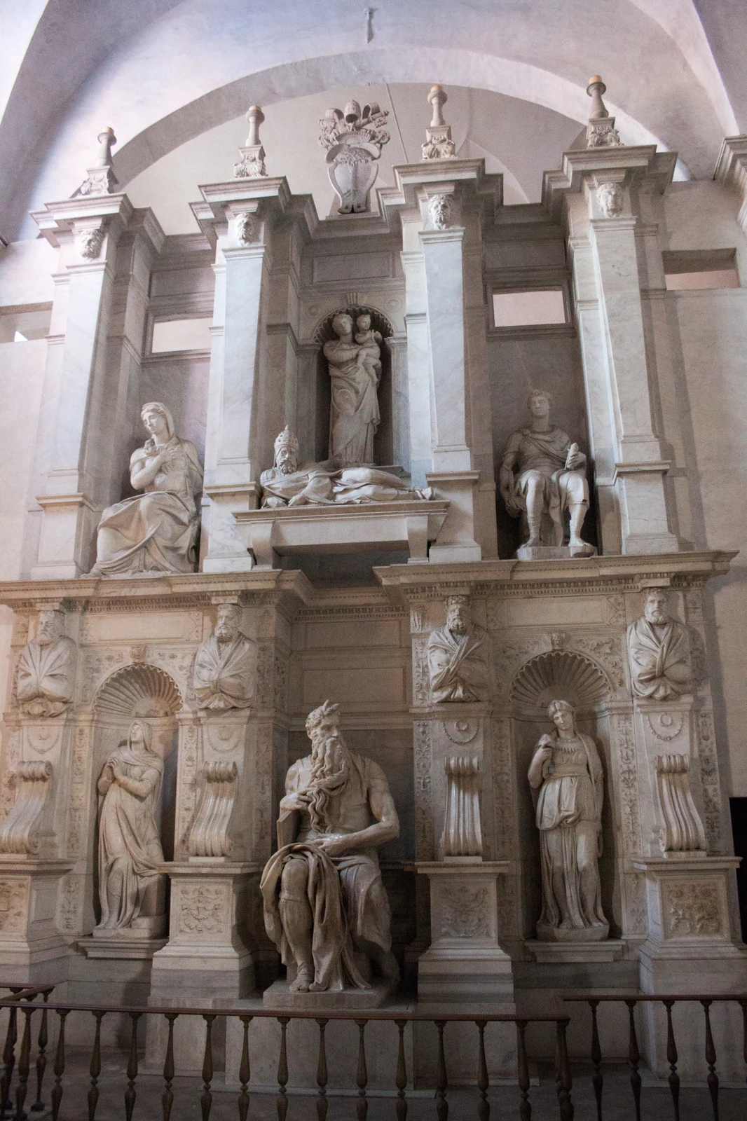 Moses by Michelangelo, 1513-1515 &mdash; the seated prophet with the tablet of the law under his arm, his gaze turned sharply aside